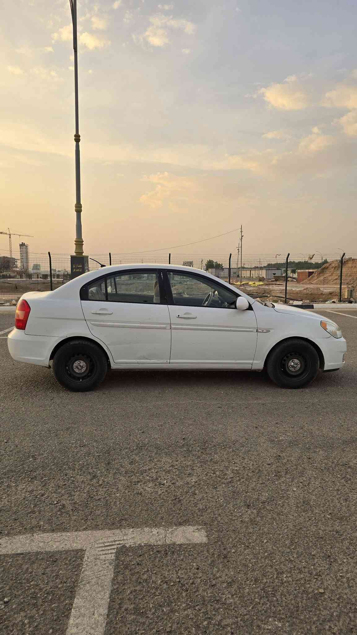 اكسنت ٢٠٠٩ • مكفولة جير ومكينة • رقم بغداد