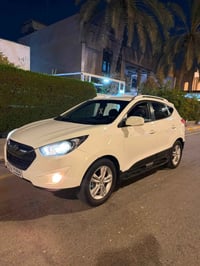توسان 2010 ماشيه 110 سياره نصيفه مابيه اي نقص محرك 2400 دوش  رقم بغداد...