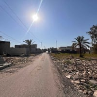 كاع مساحة 260 متر صافي واجهة 10 نزال 26  علا شارع تبليط مي وكهرباء وان...