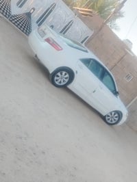 كامري ٢٠٠٨ • ماشي ٢٩٢ الف • رقم بغداد