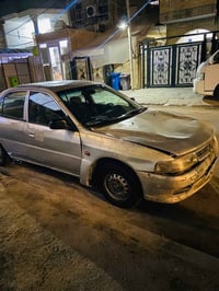 لانسر • ٢٠٠١ • رقم بغداد