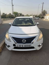 نيسان سني 2021 هندي رقم اربيل بأسمنا شرط التحويل  السيارة بيها ملاحظات...