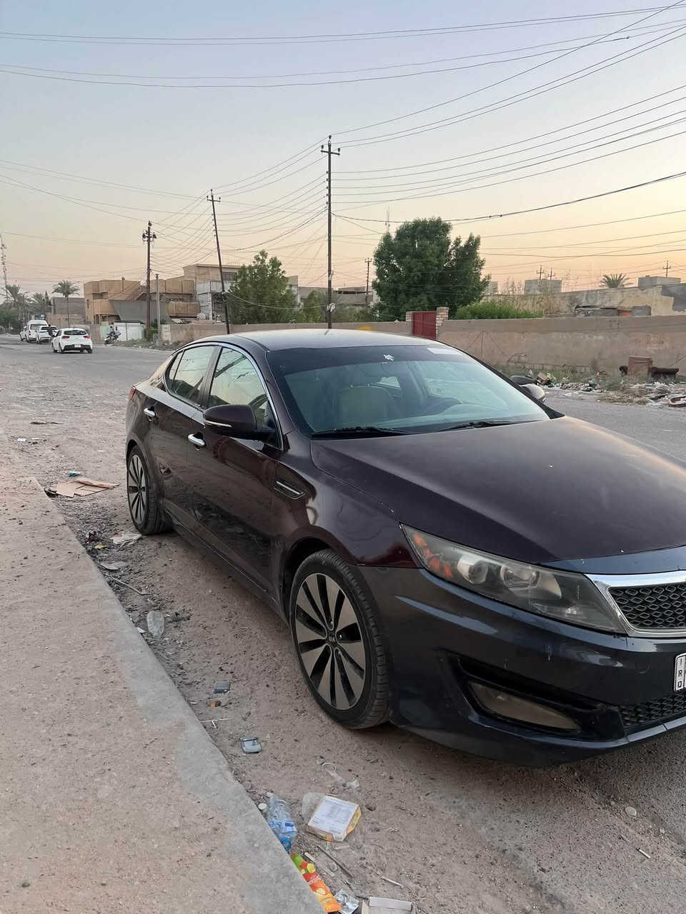 السلام عليكم اوبتيما 2013 وارد امريكي مكينه 2400 GDI
حادثها الجاملاغات الاماميه فقط 
مكينه خير من الله تبريدها ثلج 
حداديه جديده امامي وخلفي 
السياره يرادلها ترتيبات بوليش وحمام تطلع جديده 
لان الحجي ميطلع بيها هواي والسياره متروكه
رقم انكليزي واسط 
مكاني بغداد المحموديه ***********
