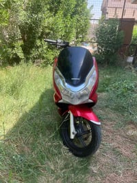 هوندا PCX • الجيل الاول • دخان بالدوس