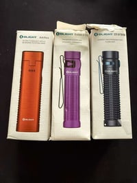 لايتات olight • برتقالي بنفسجي نيلي • بغداد توصيل