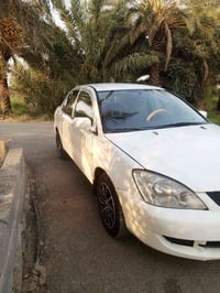 لانسر 2011 • رقم ديالى • مصبوغه