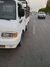 كيا ٩٦ • أبيض • رقم بابل
