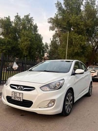 اكسنت • ٢٠١٥ • رقم بغداد