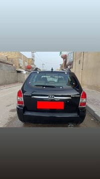 توسان موديل 2008 وارد امريكي باسمي رقم بغداد السعر ٨٠ رقم الهاتف 07705...