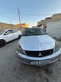 سيارة لانسر موديل 2007 تبريد شغال سيارة حلوة بس بيها جراد شوية محرك وگ...