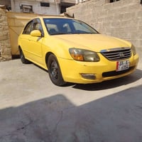 سلام وعليكم كيا سبكترا 2009 امريكي محرك 2000 حادثها جاملغ ايمن فقط بدو...