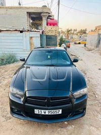 جارجر ٢٠١٤مكينه ٣٦٠٠بيهه قطعتين حادث وثنين كلير سيارة حلوه وكاعده شكله...