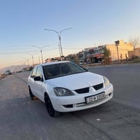 لانسر ٢٠٠٨ • تجديد ٢٠٣٠ • نوافذ كهربا