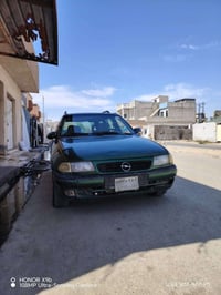 أسترا ١٩٩٧ • محرك ١٨٠٠ • ورق نظيف