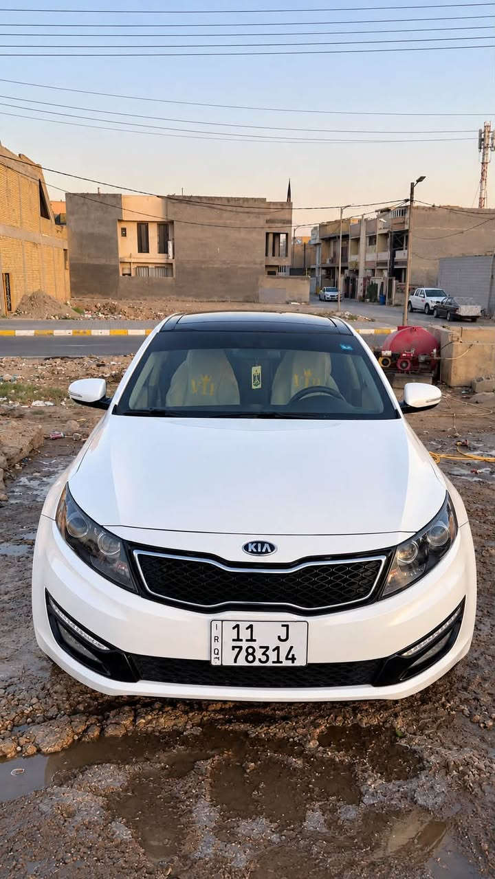 السلام عليكم
 عندي اوبتما 2013
 خليجية السيارة حلوة ما تنعاب
بسمي السيارة رقم بغداد تحويل مباشر 
السيارة محرك 2000 دوش ما مفتوح
كير السيارة مفتوح بس جديد 
الصبغ بيها تقريباً تلث قطع وسونار بل منشور موجود 
السيارة خير من الله نقصها فقط سايق 
مواصفاتها فول فول فول ما نقصها شي ابد 
السعر 115 عارضها واني رجال ابيع بس مو اليكسر بحلالي الي يدفع حق الله السيارة موجودة بل كوت الخاجية ونشالله خير 
السيارة بلكون الخاجية ***********

نص مكتوب في الصور:
- خليجي ❤️😉