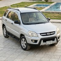 KIA سبورتاج 2009 رقم بغداد ألماني وارد خليجي  محرك 2000 تبريد ثلج شاشه...