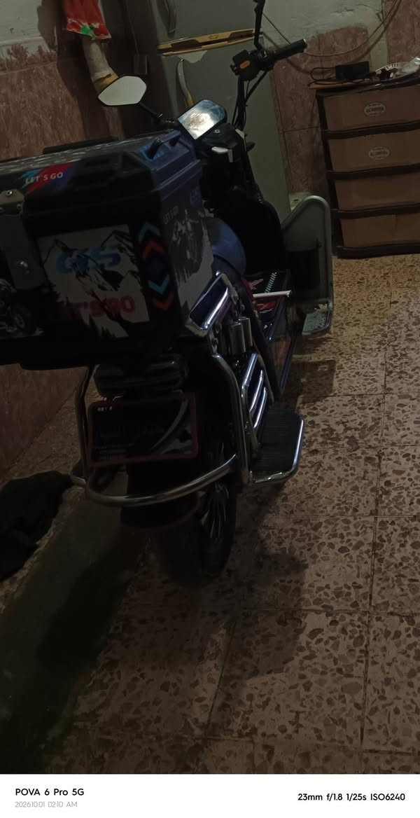 السلام عليكم دراجه شحن نوع جبلي  للبيع  الدراجه نضيفه احله من الصوره بطارياتها جدد  بيها نضام آر رجوع للخلف نضام بي وقوف جنطه لاصليه من عدها وبيها أم التجوه بيها بلوتوث لاصلي الدراجه كلها بلاديه
شاحنه   سريعه بمقدار 72 فولت  الدراجه مكفوله من البرغي للبرغي  سعر الدراجه 750 وبيها مجال قليل موديل 2025  لاستفسار علا الواتساب ***********

نص مكتوب في الصور:
- POVA 6 Pro 5G
- 2026.10.01 02:10 AM
- 23mm f/1.8 1/25s ISO6240
- POVA 6 Pro 5G 2026.10.01 02:09 AM 23mm f/1.8 1/20s ISO7740