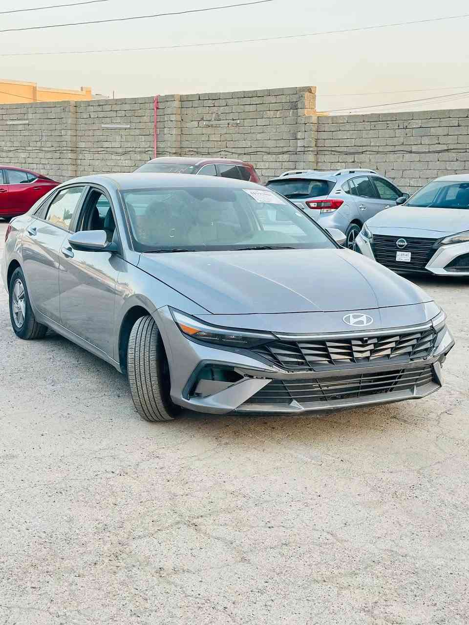 🔥 وصل حديثاً لمعارضنا (شركة الهيبة لتجارة السيارات) 🔥
🚗 هيونداي النترا
📌 الموديل: 2024 (الوجهية والنزلة الجديدة)
🎨 اللون: رصاصي (سيلفر ملكي)
⚡ الفئة: SE (قياسية، نظيفة وكلش حديثة)
📝 المواصفات 
 شاشة عدادات ديجيتال وشاشة وسطية.
 ماشية مسافة قليلة (حوالي 8,859 ميل).  
 الداخلية لونها رمادي هادئ ونظيف، گير ومحرك جديد (شرط السحب والـ PDI).
 والستيرن وكلشي شغال وبديكورات الوكالة.
بصمة شباب ورياضية، وتدلل على العيون، موتر جاهز للترقيم والنقرة الطيبة.
📍 الموقع: الشرقاط الجميله 
📞 للإستفسار والسعر، يرجى مراسلة الصفحة أو الاتصال على الأرقام المثبتة. ***********
(أهلاً ومرحباً بالجميع، شراي حقيقي ما نختلف وياّه) 🤝
