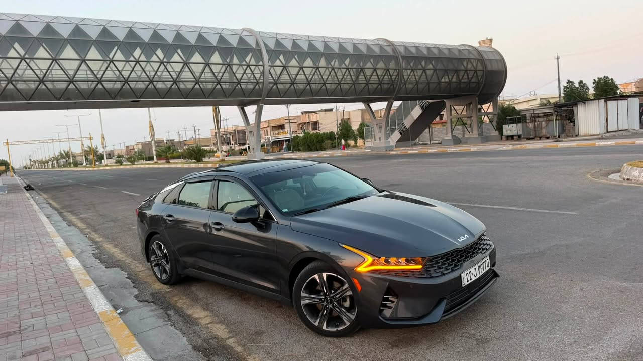 السلام عليكم حبايب 🩶
🚘 للبيع كيا K5 EX موديل 2022 فول مواصفات، اللون النفطي، وارد أمريكي، سيارة نظيفة جداً، جاهزه ومناقصها اي شي 

✨ المواصفات:

* محرك 1.6 Turbo GDI.
* جير أوتوماتيك 8 سرعات.
* 4 أوضاع قيادة: Smart - Custom - Sport - Normal
* قيادة شبه ذاتية (Lane Following Assist).
* مثبت سرعة ذكي (Smart Cruise Control).
* تحذير الخروج عن المسار مع تصحيح المسار.
* بريك طوارئ تلقائي (Automatic Emergency Braking).
* نظام الثبات الإلكتروني (ESC).
* نظام مانع الانزلاق (Traction Control).
* مراقبة النقطة العمياء (Blind Spot Monitoring)
* كاميرات 360°
* كاميرا خلفية مع حساسات أمامية وخلفية.
* شاشة كبيرة تدعم Apple CarPlay وAndroid Auto.
* نظام صوت BOSE الأصلي.
* تشغيل بصمة وبصمة أبواب (Smart Key).
* تشغيل عن بعد.
* مرايا شفط وقلاب كهربائية.
* فتحة سقف بانوراما.
* مقاعد جلد باللون الأبيض.
* مقاعد أمامية كهربائية.
* تبريد وتدفئة للمقاعد الأمامية.
* تدفئة المقود.
* ميموري (Memory Seat) لمقعد السائق.
* شاحن لاسلكي.
* مكيف أوتوماتيك دبل زون.
* إنارة LED أمامية وخلفية.
* حساسات إنارة أوتوماتيكية.
* Auto Hold.
* فرامل يد إلكترونية (EPB).
* الدشبول صاجي 

📌 العداد: 69 ألف Mile.
📌 الحادث: صندوق فقط، وصور الحادث موجودة ضمن الصور 
📌 السيارة بدون إيرباك، بدون لغود، بدون شواصي، وبجم كبس 
📌 رقم أربيل حره بأسمي تحويل ثاني يوم سنويه

💰 السعر المطلوب: 190 ورقة، وبيها مجال للطيبين 

📍 الموقع: الفلوجة

📞 للتواصل: خاص أو على الرقم ***********

