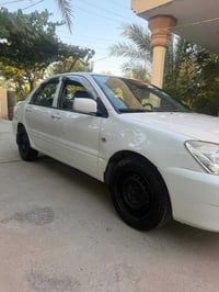 لانسر ٢٠١١ • ضرر خلفي • بعقوبة