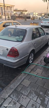 مارسيدس بيبي شبح اصل محرك خراطيم بلاد لون سلفر بغداد موديل ١٩٩٧ اذامرا...