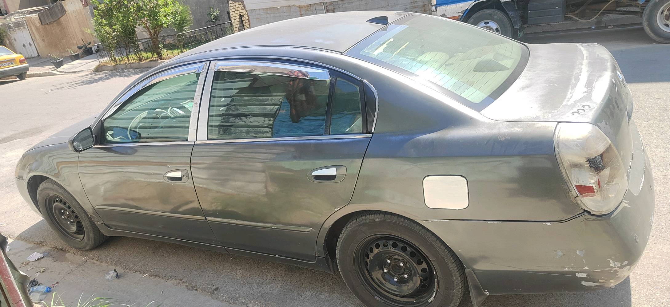 التيما نيسان ٢٠٠٧
السعر ٤٥
موقع السيارة بغداد 
رقم نجف مشروع وطني بسمي تحويل ثاني يوم
مكينة٢٥٠٠