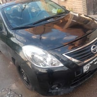 نيسان فريسا موديل ٢٠١٣ رقم واسط باسمي مشروع وطني  محرك وگير نظيفات وتب...