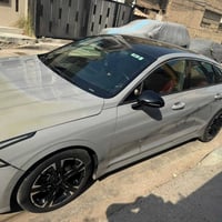 K5 2022 GT LINE لون سمنتي للبيع   محرك 1600 تيربو   بصمة ابواب وجنطة  ...