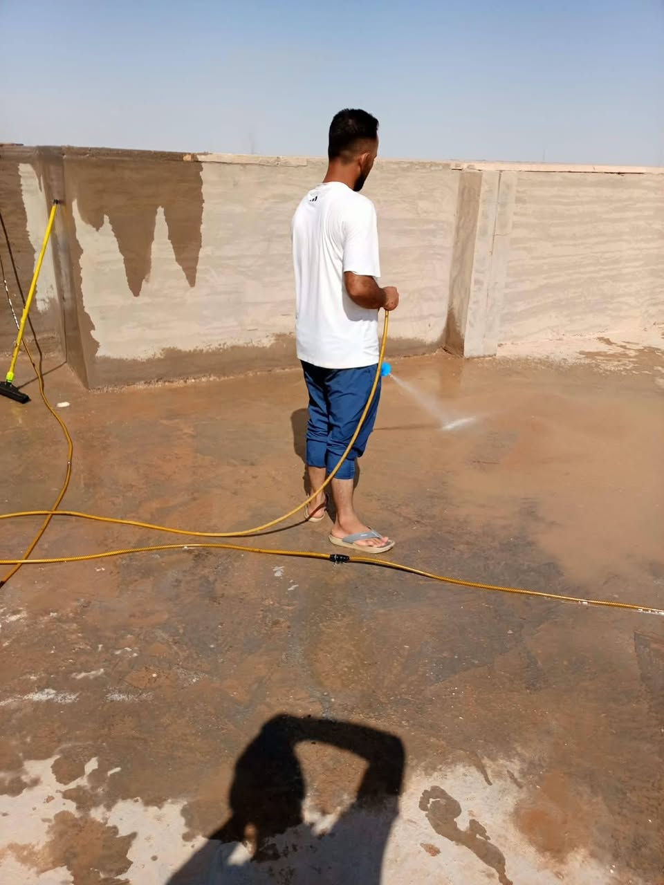 النجف الاشرف • تنضيف السطح • تزفيت بالقير