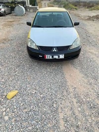 لانسر ٢٠١٠ • محرك ٢٠٠٠ • رقم بغداد