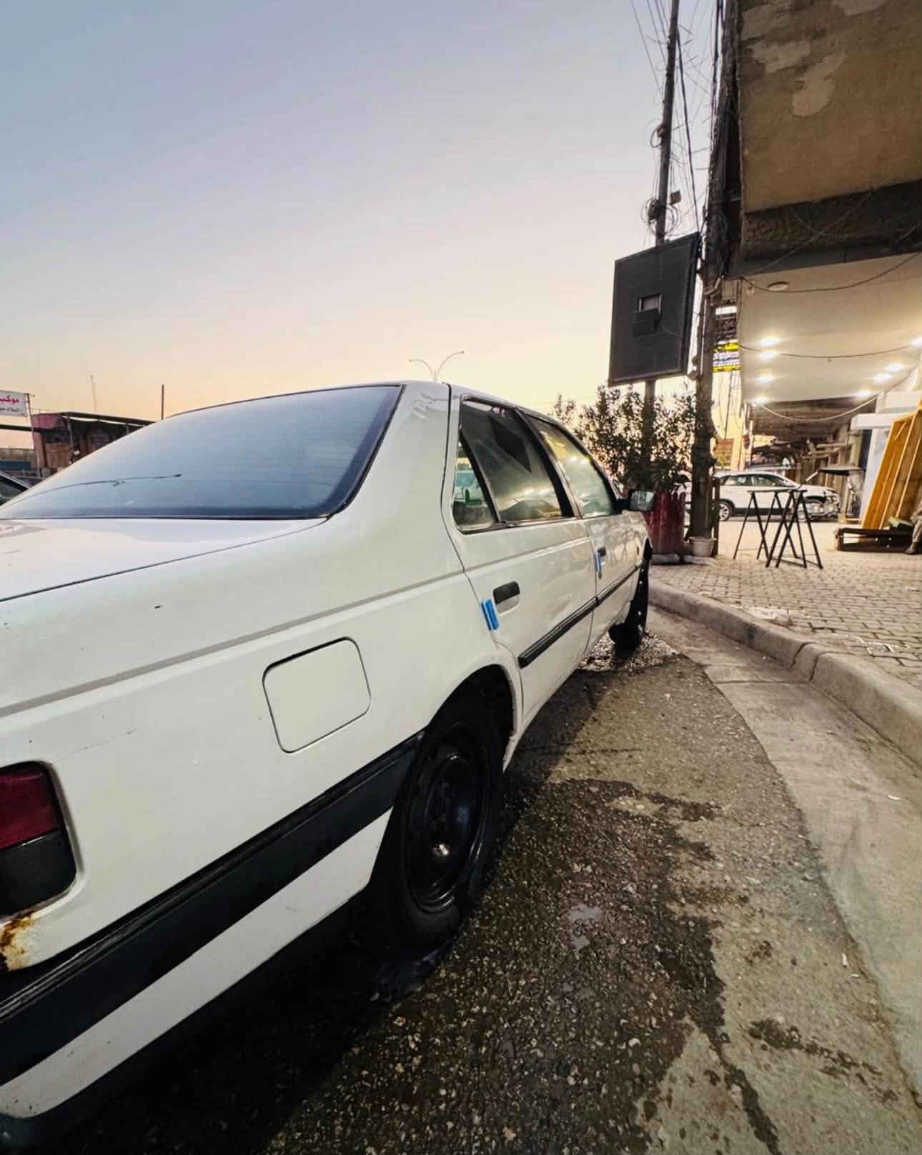 بيجو 405 • رقم بغداد • تحويل مباشر