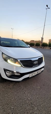 كيا سبورتج ٢٠١٤ خليجي  فقط صبغ باب السكن فقط صبغ بدون اي دواخل  وكلشي ...