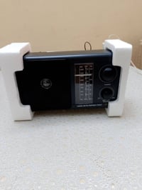 راديو قيثارة • AM SW FM • ٣ بطاريات