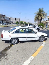 اوميغا • قير ومحرك • باسمي