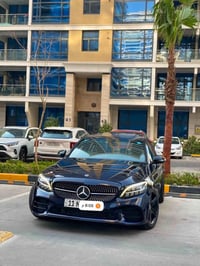 للبيع Mercedes C300 2019 (تو ويل) دفع خلفي   ماشيه 48  سلايد شاشه كبير...