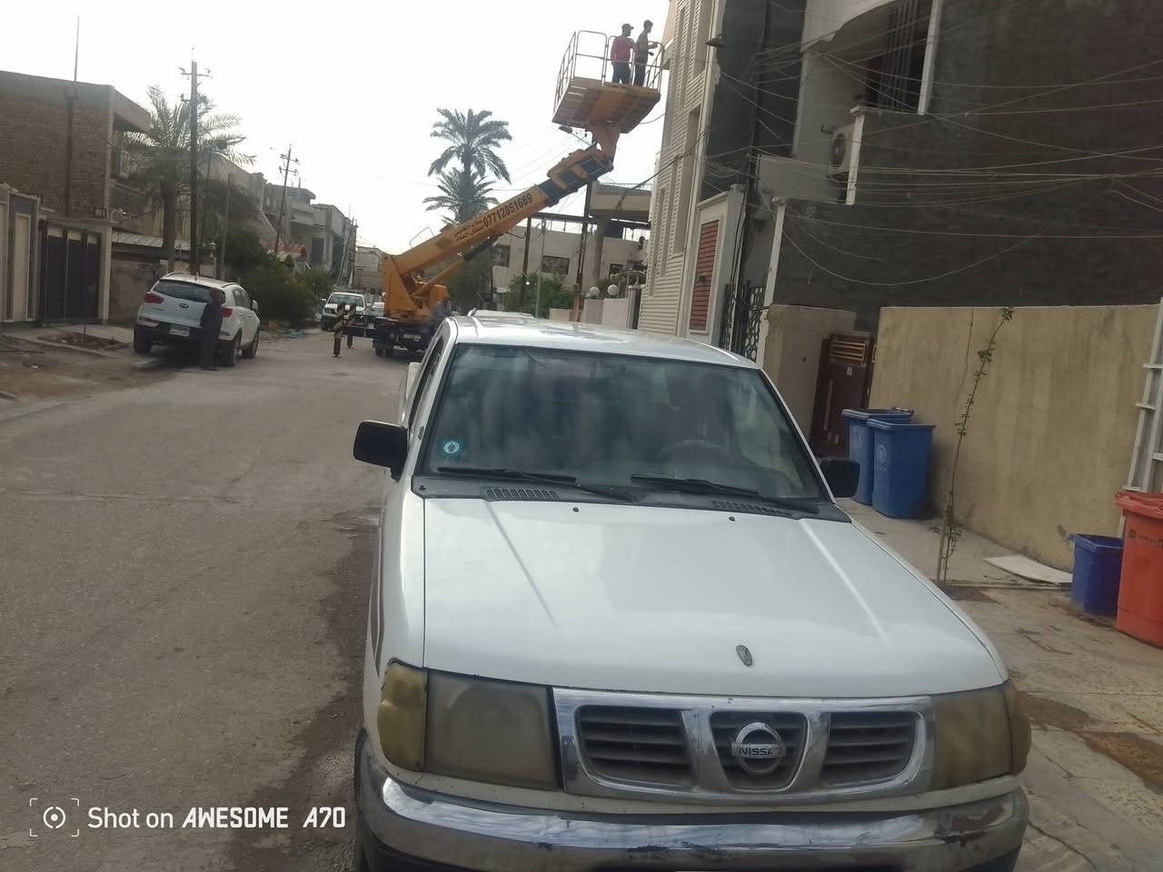 عندي بيكب نيسان 2000 كير اوتو بلاد تعليك محرك ونجي 6 سلندر بيه جراد مصبوغة صورته الاصابع موجودة مال الجراد حزام تبريد تخم تاير رقم بغداد سنويه لل28 بأسمي مكان السيارة بغداد نفق الشرطه واتس اب***********

نص مكتوب في الصور:
- Shot on AWESOME A70