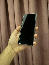 نوت 40 برو • نظيف • كرتونه وشاحن اصلي