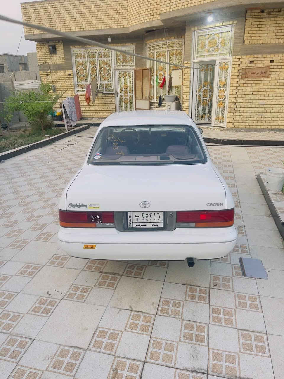 كورولا ٩٥ • ابيض • رقم بغداد