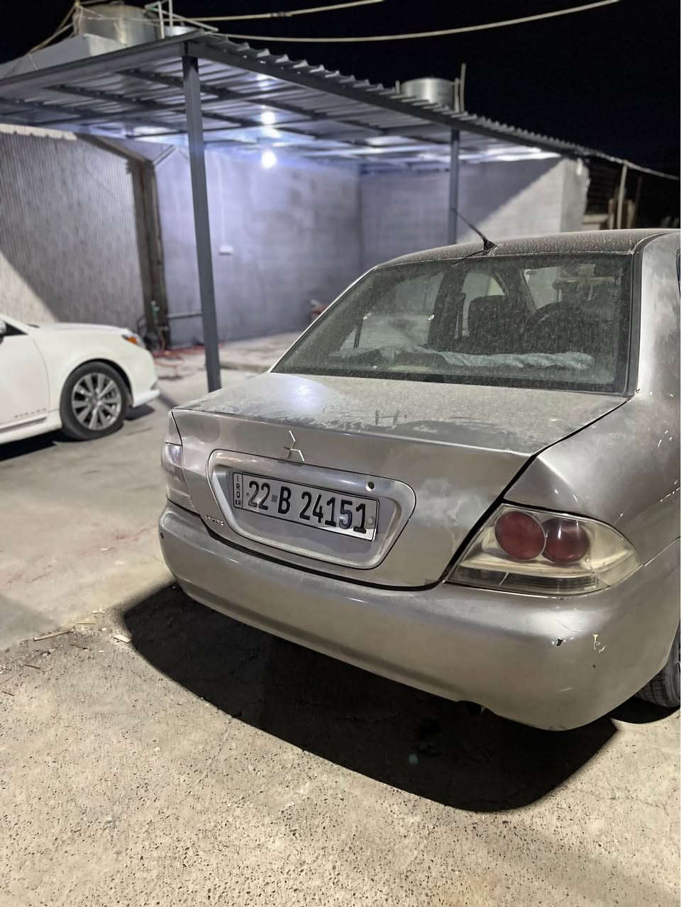 لانسر ٢٠٠٩ • بلا مشاكل • رقم اربيل