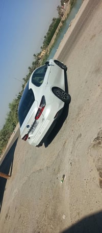 كامري هايبرد • موديل ٢٠٢٤ • رقم بغداد