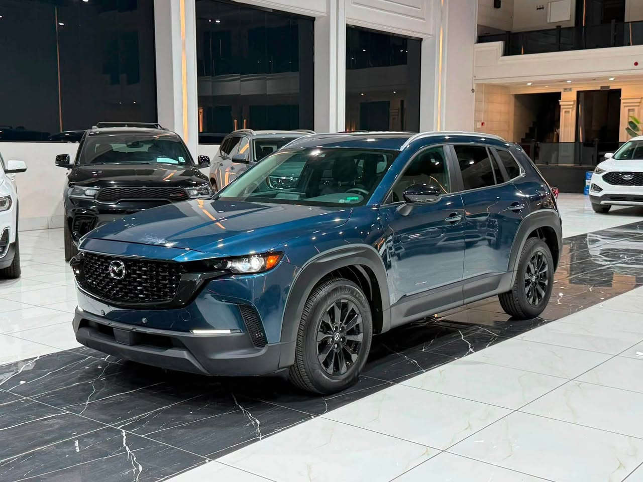 ‎مازدا Cx50 2024 فورويل AWD
‎حجم المحرك 4 سلندر 2500cc تنفس طبيعي 
‎عدد المقاعد 5 راكب
‎السیارة ماشي 8 الف
‎حادث نص جملغ الخلفي  السائق 

‎مواصفات فول
‎- بصمة
‎- دخول ذكي بدون مفتاح
‎- دبل اكسل
‎- بانوراما
‎- مود درايڤ ايكو وعادي وسبورت
‎- رادار امامي خلفي
‎- تحديد مسار
‎- نقطة عمياء
‎- كشنات جلد
‎- شاشة
‎- ⁠كاربلي CarPlay 
‎- كامرة خلفية
‎- تبريد مركزي قطعتين
‎- صندوق خلفي كهرباء
‎- سايد بريك لمس
‎- اوتو هولد
‎- لايت امامي ليد
‎- هيتر -تبريد كشنات امامية
‎- هيتر ستيرن 
‎- اشاير مري
‎- تخم تاير جديد 
‎- تخم دسكات جديد 
‎وبقية المواصفات موضحة بالصور ‎
‎مکان سیارة اربیل السیارە رقم کاتي تترقم شمالي
‎للاتصال والاستفسار
‎☎️کورك ***********
‎‏‎☎️اسیاسیل ***********
