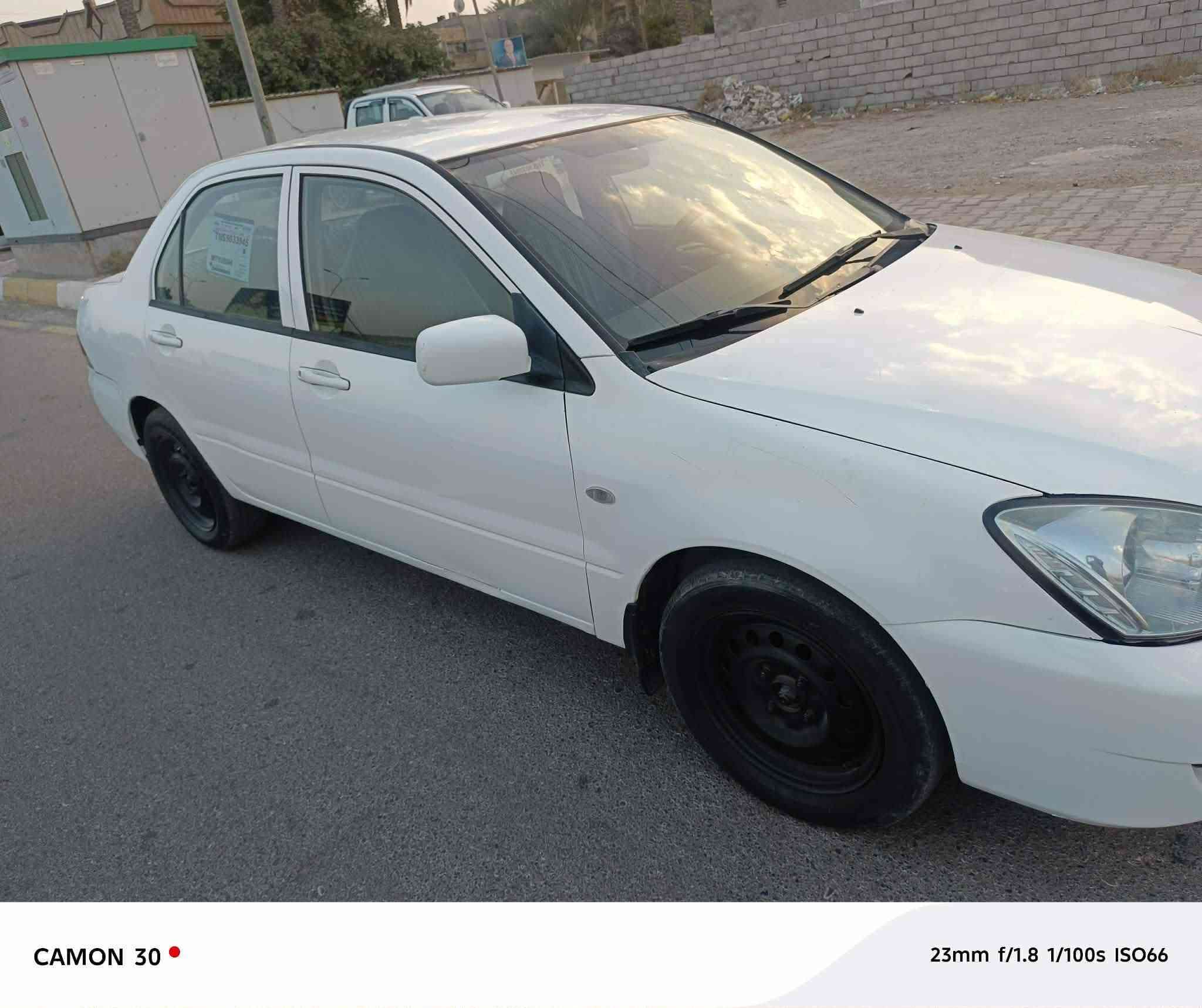 لانسر 2009اللون ابيض رقم ديالى سنويه ل28سيارة حلوة ونظيفه بيه تبديل بنيد والبدنه صبغ الدعامية فقط بدون قطرة معجون كير ومحرك وصدر وتبريد وتخم تاير كله جديد السعر 72للاتصال على الرقم ***********استاذ محمد والسيارة موجودة في بعقوبة.

نص مكتوب في الصور:
- CAMON 30  23mm f/1.8 1/100s ISO64
- CAMON 30 23mm f/1.8 1/100s ISO66
- CAMON 30 23mm f/1.8 1/50s ISO278
- CAMON 30
- 23mm f/1.8 1/100s ISO77
- CAMON 30 • 23mm f/1.8 1/50s ISO333
- CAMON 30  23mm f/1.8 1/50s ISO178
- CAMON 30  23mm f/1.8 1/50s ISO131