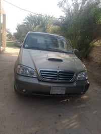 سيارة كيا كرنفال 2000 امحدثه 2005 رقم مشروع وطني اداورلك بالمثنئ  8راك...