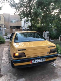 وبركاته  بيجو GLXموديل ١٢  رقم بغداد انكليزي هيئه غرامات مصفره  السيار...