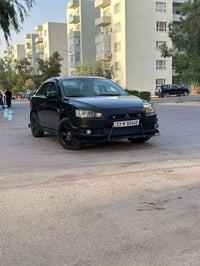 للبيع او المرواس  متسيوبوشي لانسر قرش خليجيه موديل 2008 رقم بغداد الإن...