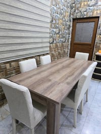 ميز طعام خشب مع 6 كراسي يتكبر ويصغر و يحتوي على جرار داخلي