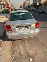 كيا ريو 2003 بغداد تبريد شغال كير محرك مبدل جديد سياره جهازه لون سلفر ...
