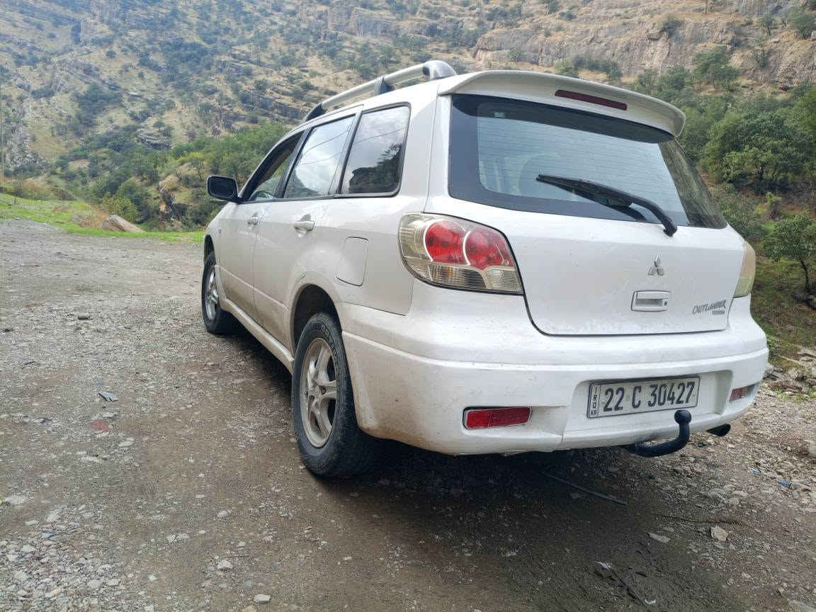 اوتلاندر ٢٠٠٣ • دبل اكسل AWD • اوتوماتيك