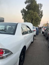 لانسر ٢٠٠٦ • محرك ١٦٠٠ جديد • كفالة عامة