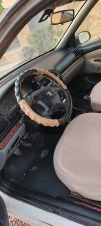 بيجو فرنسي • مكينة سليمة • تايرات جديدة